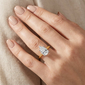 RM12607C-LD Pear 8-prong solitaire engagement ring hand-model