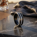 Polished black tungsten wedding ring with channel-set white CZ eternity inlay and beveled edges, 8mm comfort fit