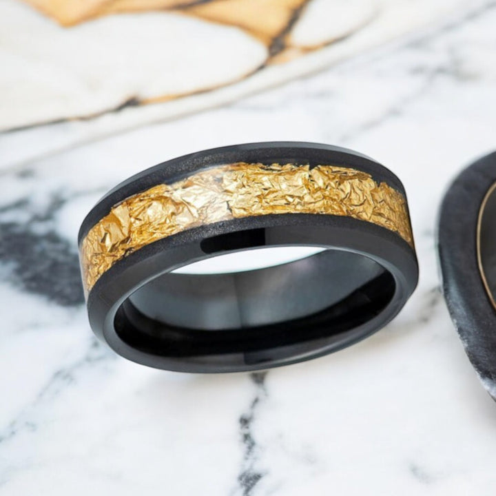 Close-up of gold foil inlay on the ZORYN black tungsten wedding band.