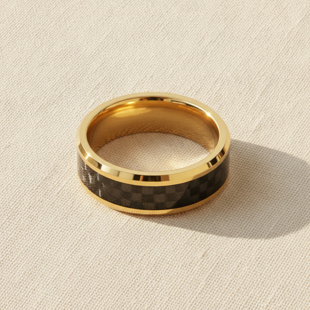 DECIMUS gold-plated tungsten carbide wedding band with black carbon fiber inlay macro detail overhead flat lay