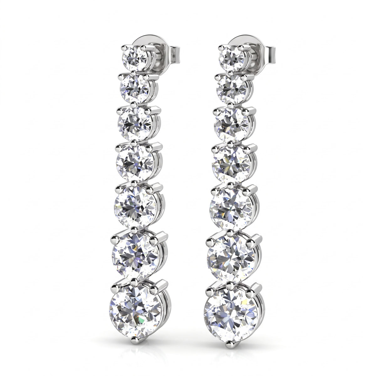 Three Prong Graduated Diamond Earrings, 925 silver earrings studio hero photo on white, lab grown diamonds D color VVS