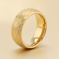 GILDUR gold-plated tungsten wedding band with domed hammered finish, studio hero shot