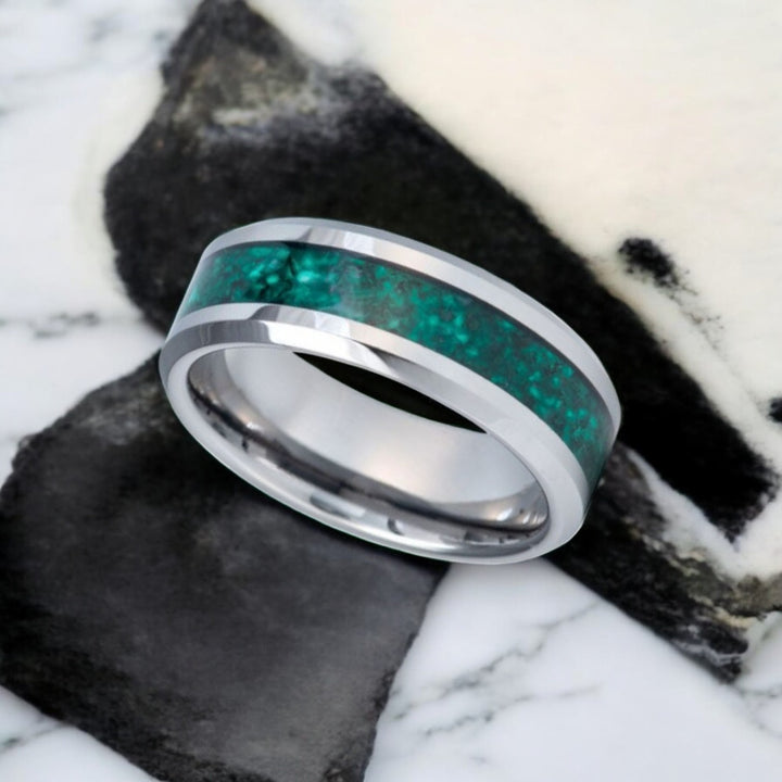 Nature-inspired VERDORA tungsten wedding band with green inlay and polished edges.