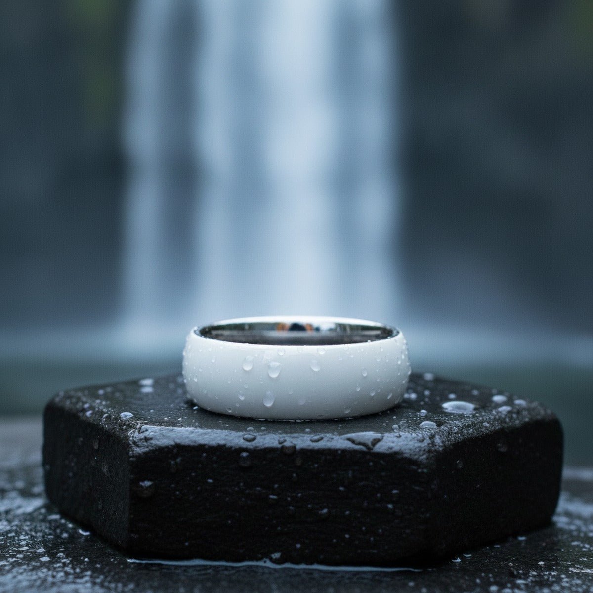 Aydins ALABASTER | Silver Ring, White Ceramic Ring, Domed lifestyle scene, waterfall basalt