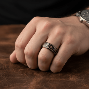 ALTIN — Lifestyle photo on hand — men's tungsten wedding ring.