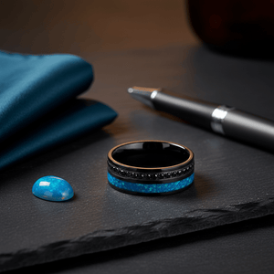 AQUORION — Editorial masculine still life — men's tungsten wedding ring.
