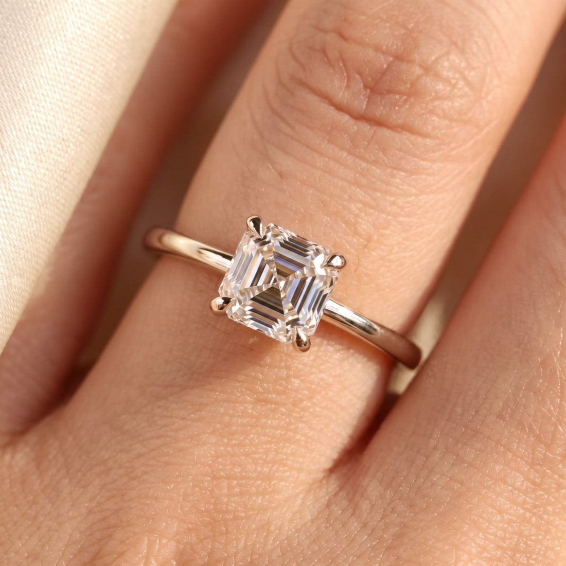 Asscher lab-grown diamond solitaire engagement ring, White Gold, on-finger close-up