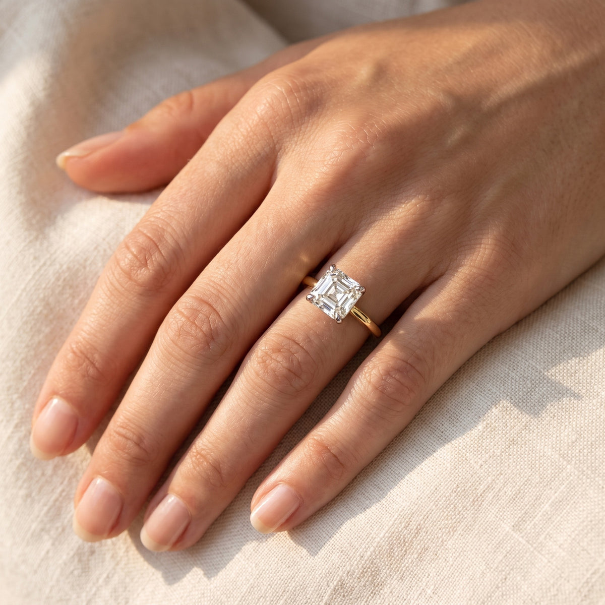 VIVIAN asscher lab-grown diamond ring in 10K two-tone gold, worn on the hand, approx. 1 ct center