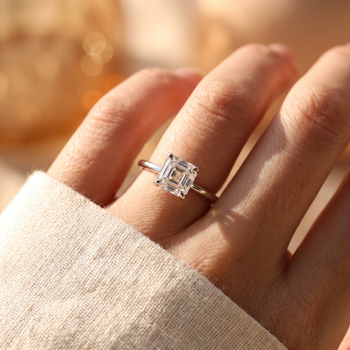 Asscher lab-grown diamond solitaire engagement ring, White Gold, lifestyle photograph