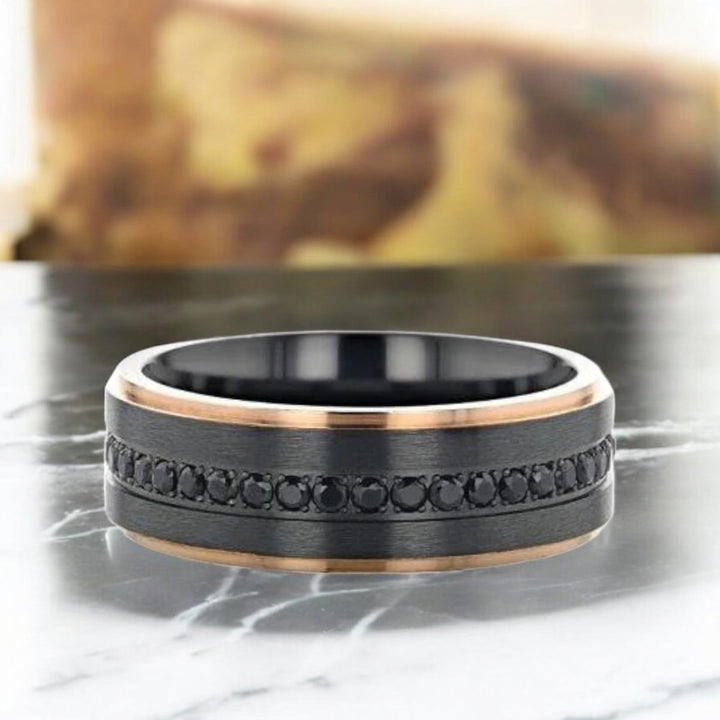 Sleek black titanium wedding band with all-around black sapphires and luxurious rose gold edges - Aydins Jewelry.