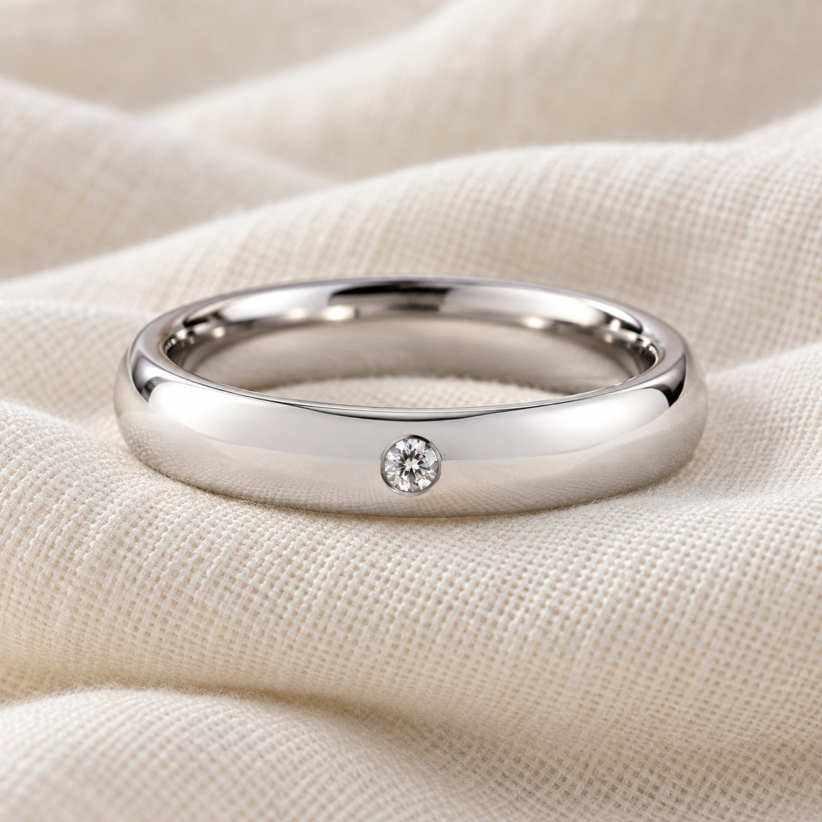 GALE domed tungsten band with white diamond, flatlay