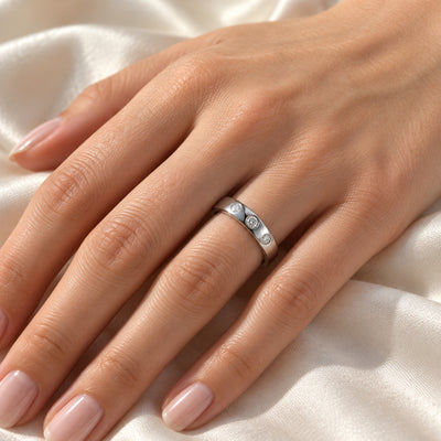 ISABELLA domed tungsten band with three white diamonds, on hand