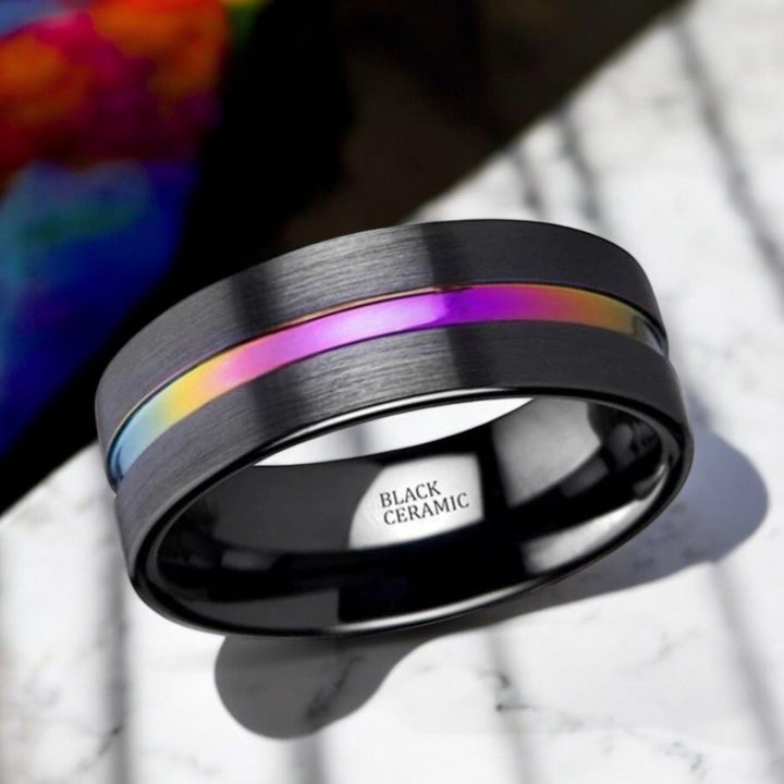 AZURE black ceramic wedding band featuring sleek brushed finish and colorful rainbow groove - Aydins Jewelry.