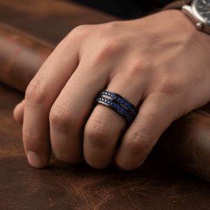 AZURON — Lifestyle photo on hand — men's tungsten wedding ring.