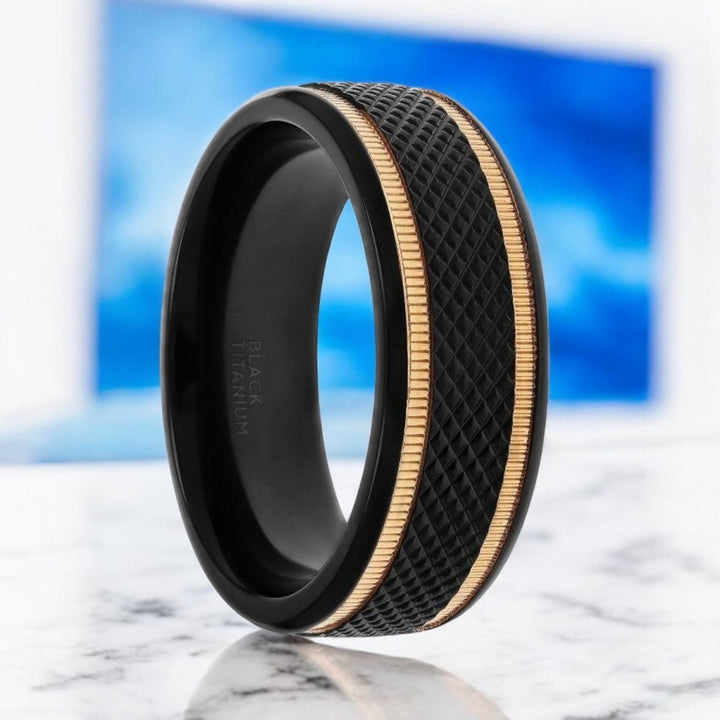 Black titanium ring with diamond pattern brushed finish and gold milgrain grooves, 8mm width - Aydins Jewelry.