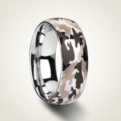 BATTALION domed silver tungsten carbide wedding band with laser engraved camouflage pattern running around the band and polished edges, studio hero shot