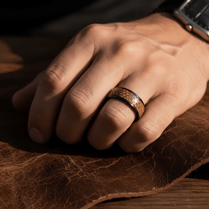 BEASON — Lifestyle photo on hand — men's tungsten wedding ring.