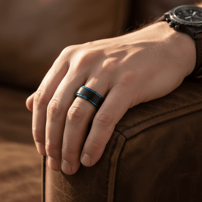 BLIGHT — Lifestyle photo on hand — men's tungsten wedding ring.