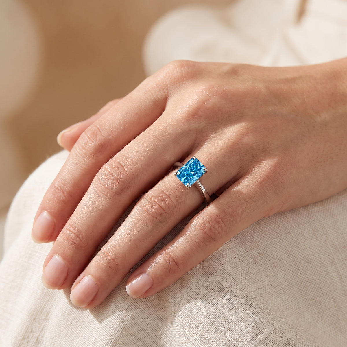 Blue Radiant lab-grown diamond solitaire engagement ring, White Gold, lifestyle photograph