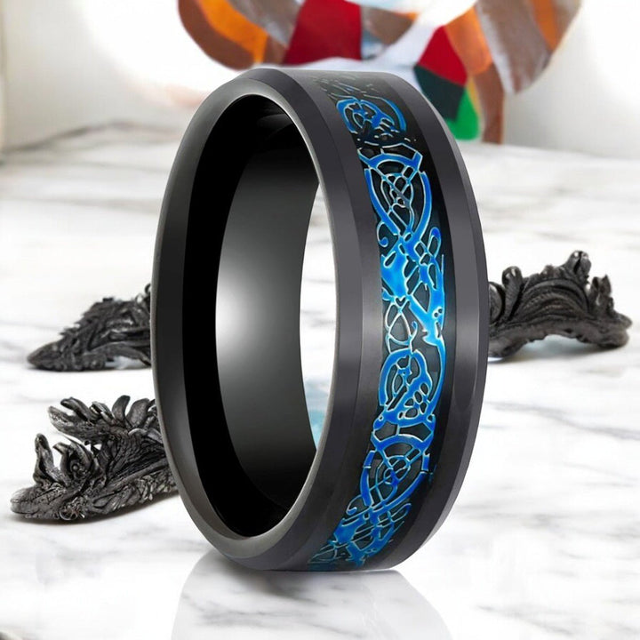 BlueKnot black tungsten ring with black and blue Celtic dragon inlay.