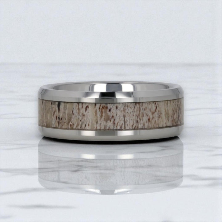 Polished beveled edge and antler inlay detail on BUCK ring