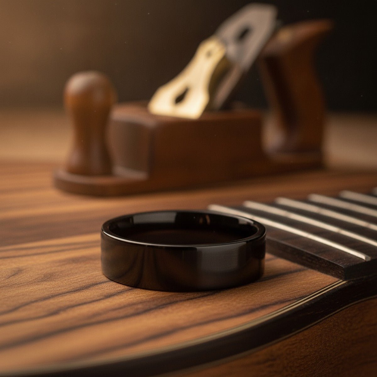 Aydins BURNSLEY | Black Ring, Black Tungsten Ring, Shiny, Flat lifestyle scene, luthier shop