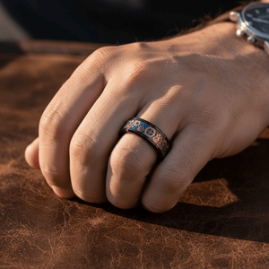CARBULEUM — Lifestyle photo on hand — men's tungsten wedding ring.
