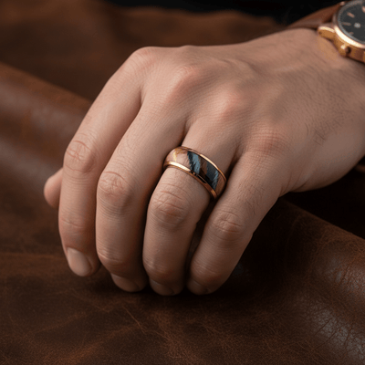 CARVEDEN — Lifestyle photo on hand — men's tungsten wedding ring.