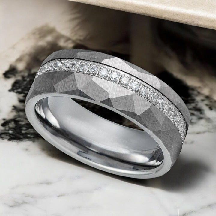 Top view of CASCADE Tungsten Wedding Band with sparkling CZ channel.