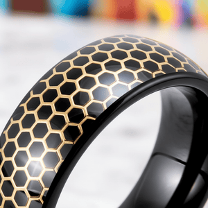 CASTORLAND — Extreme macro detail — men's tungsten wedding ring.