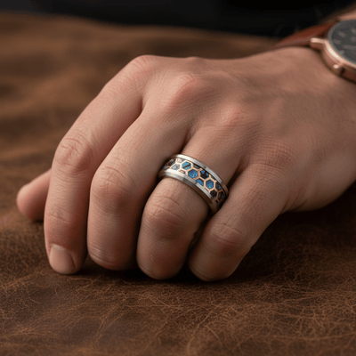CHAZY — Lifestyle photo on hand — men's tungsten wedding ring.
