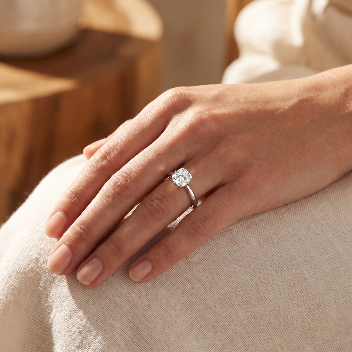 Cushion lab-grown diamond solitaire engagement ring, White Gold, lifestyle photograph