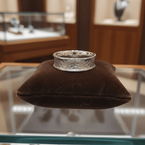 DECIUS — Premium boutique display on velvet — men's tungsten wedding ring.