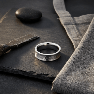 DECIUS — Editorial masculine still life — men's tungsten wedding ring.