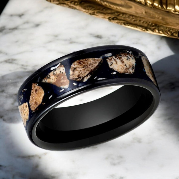 Side view of DESERTSTONE Tungsten Ring showcasing natural rhodochrosite inlay.