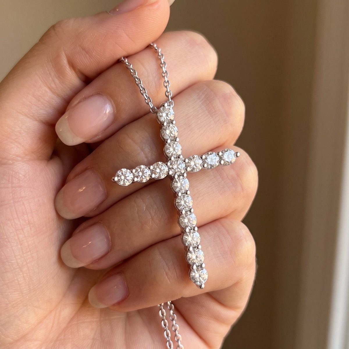 Diamond Cross Pendant With Chain 925 silver lab grown diamond pendant held in hand lifestyle close-up photo
