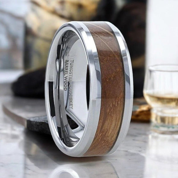 DISTILLED silver tungsten ring with whiskey barrel wood inlay and beveled edges.