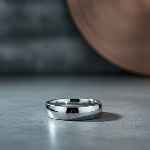 Aydins DOMINUS | Silver Tungsten Ring, Shiny Domed lifestyle scene, concrete industrial