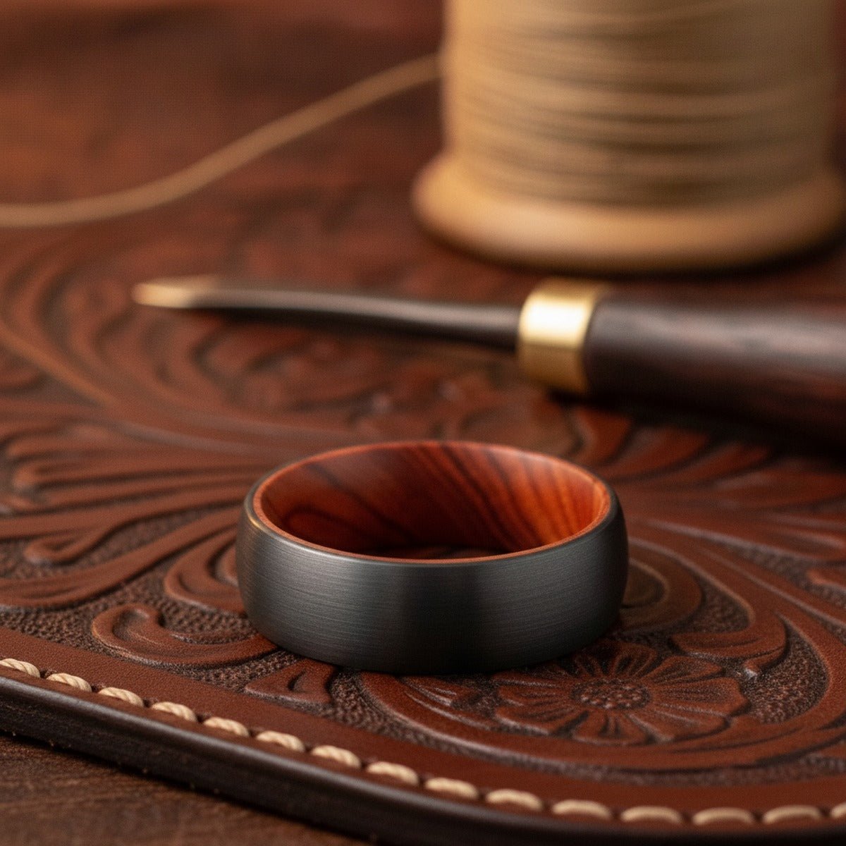 Aydins DRURY | Tungsten Bocote Wood Inlay Ring 8MM lifestyle scene, leather atelier