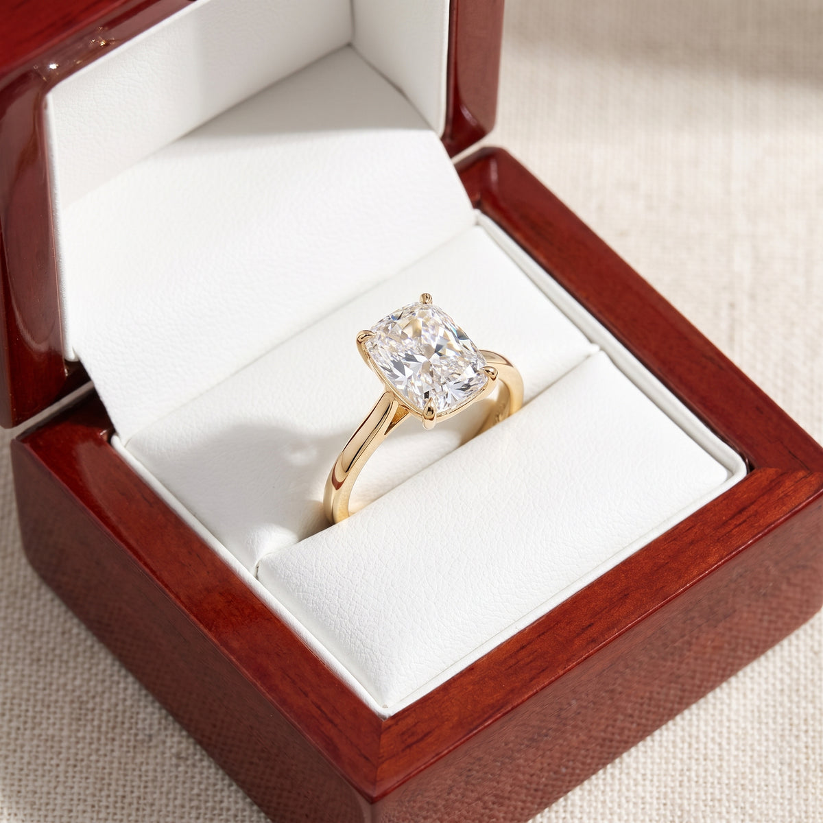 Elongated Cushion lab-grown diamond solitaire engagement ring, Yellow Gold, in cherry-wood ring box