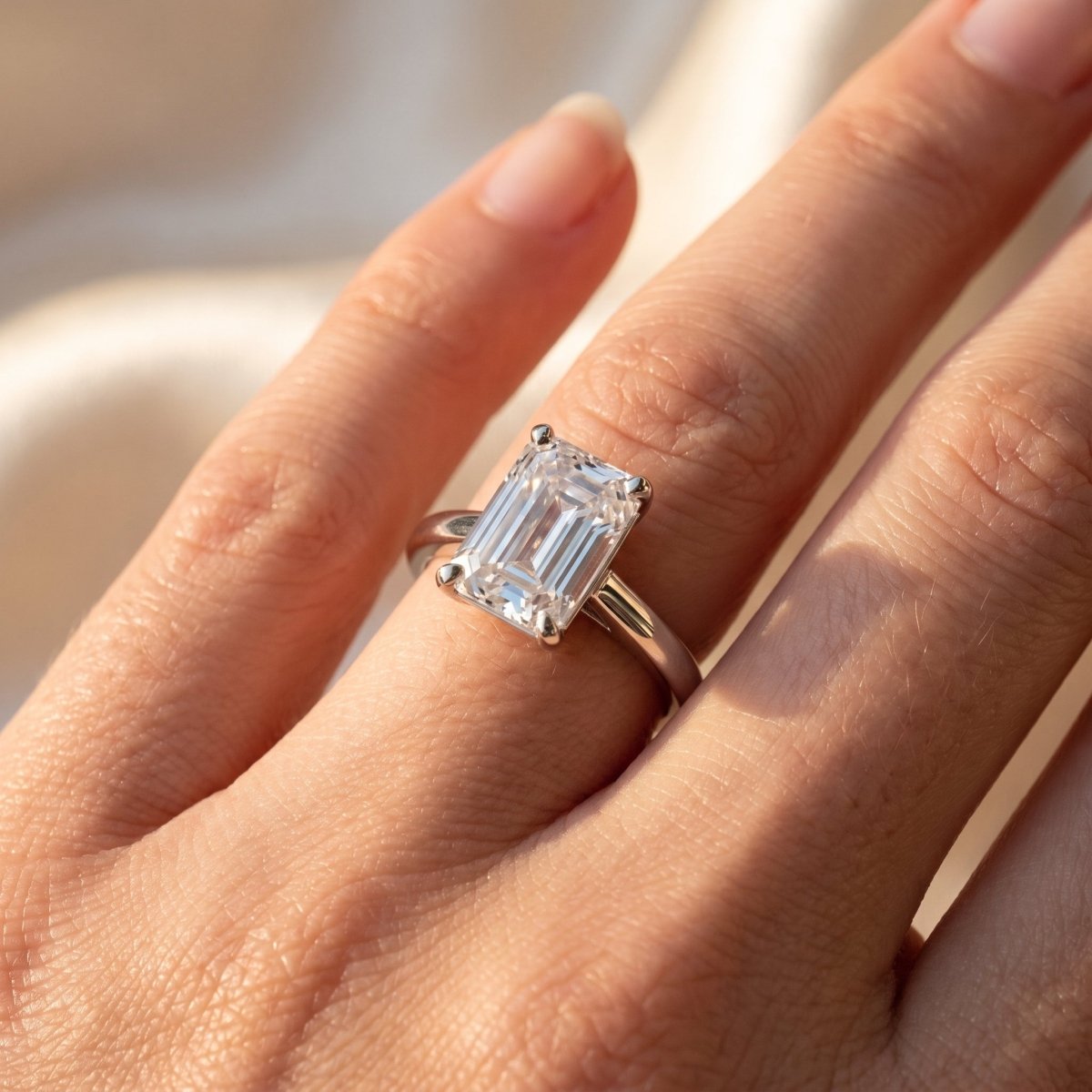 Emerald lab-grown diamond solitaire engagement ring, White Gold, on-finger close-up