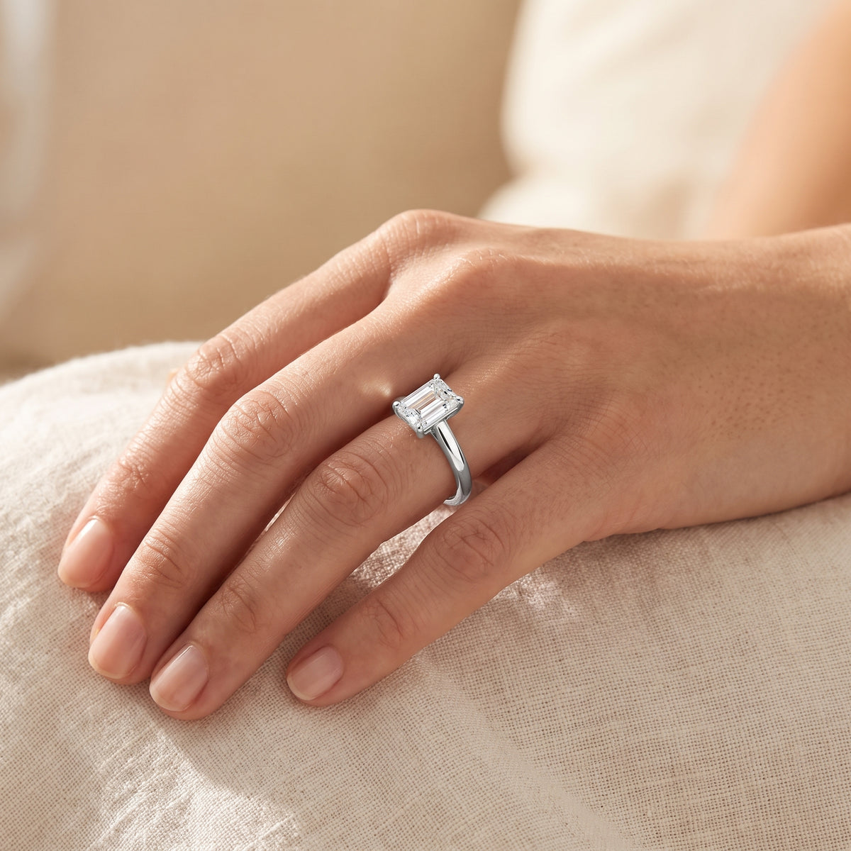 Emerald lab-grown diamond solitaire engagement ring, 925 Sterling Silver, lifestyle photograph