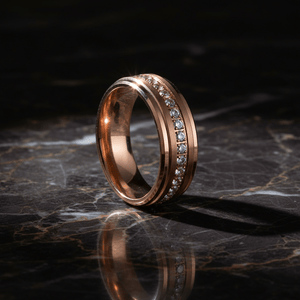 ENER — Luxury 3/4 angle on dark marble — men's tungsten wedding ring.