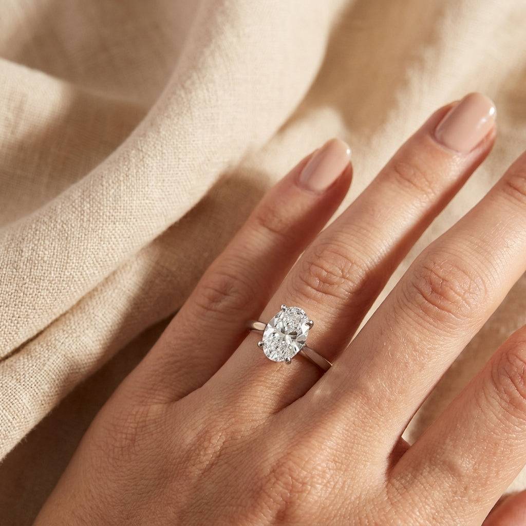 3 carat oval lab grown diamond engagement ring - hand model