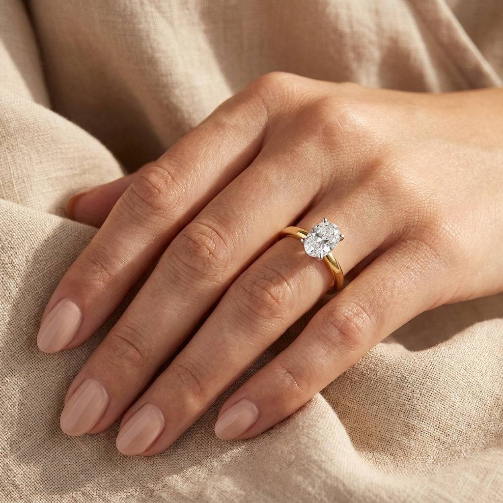 1 carat oval lab grown diamond engagement ring - hand model