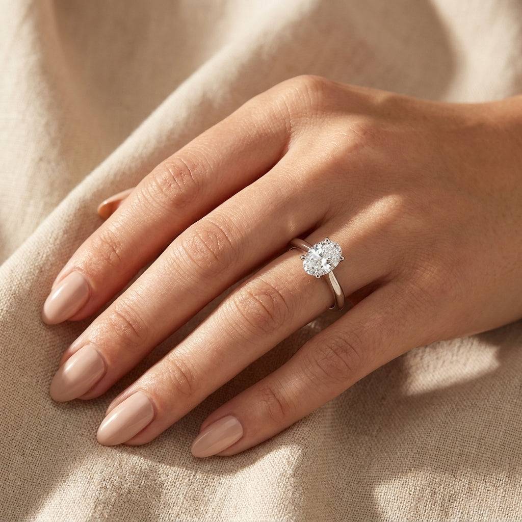 1.5 carat oval lab grown diamond engagement ring - hand model