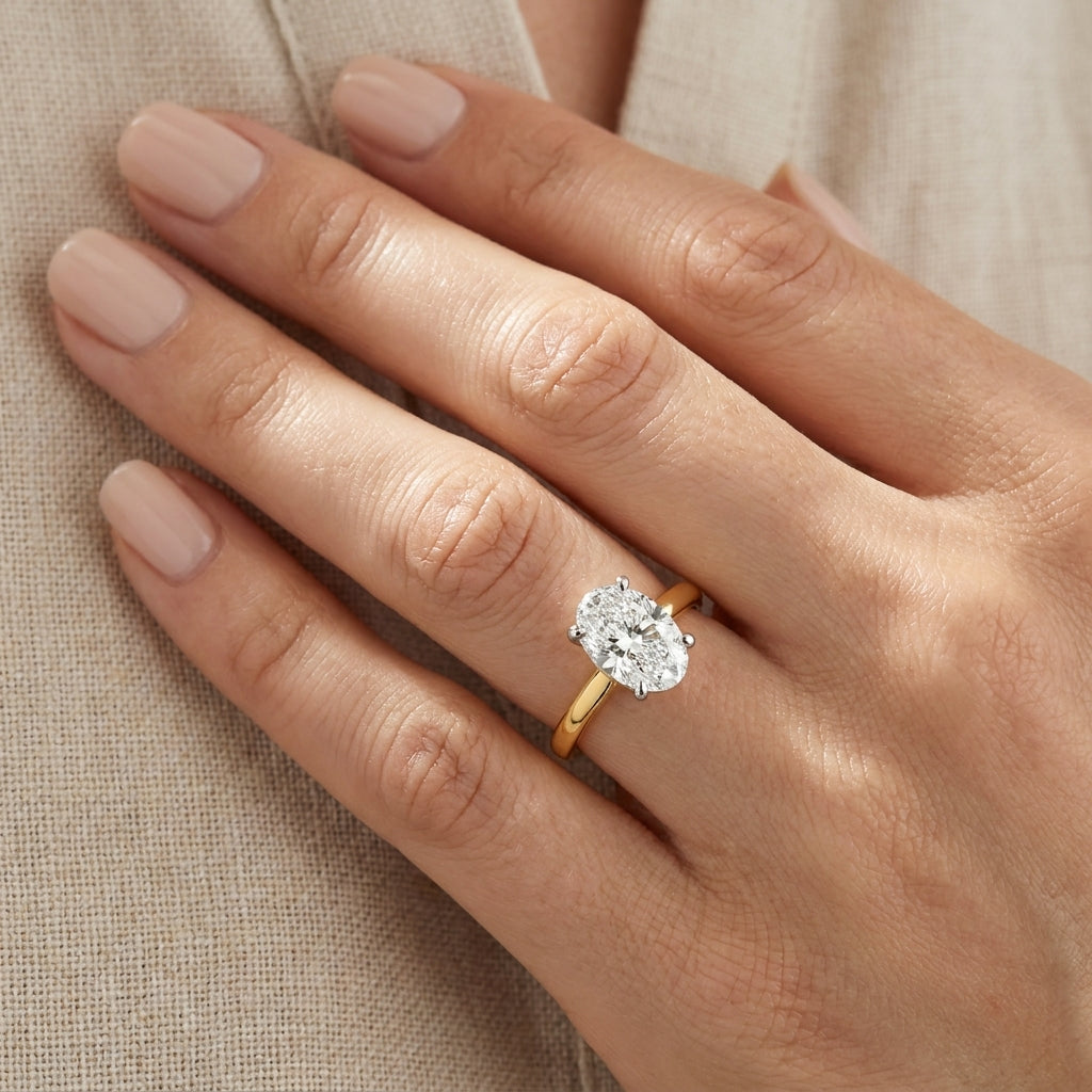SOL-200O-0LD Oval solitaire engagement ring hand-model