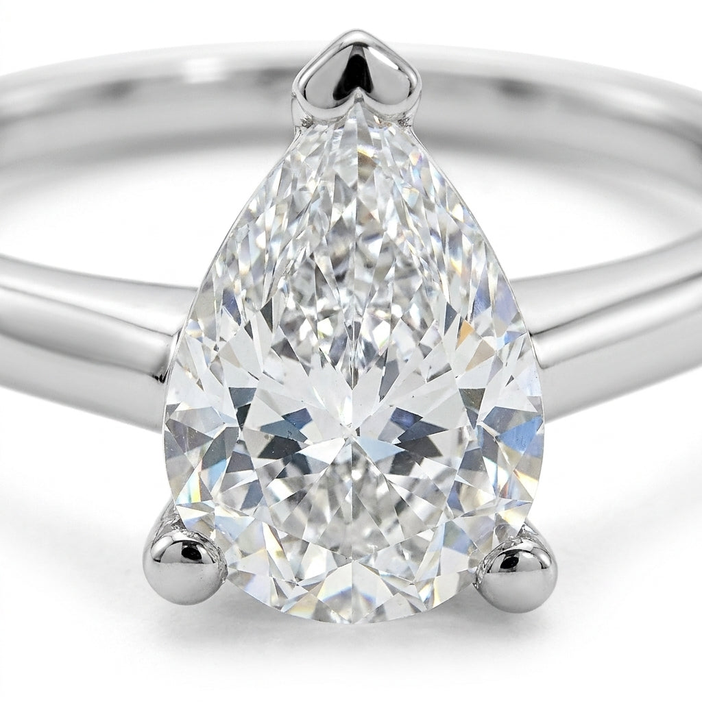 SOL-200PE-0WLD Pear solitaire engagement ring macro-sparkle