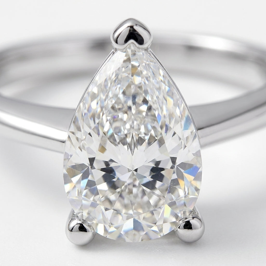 SOL-250PE-0WLD Pear solitaire engagement ring macro-sparkle