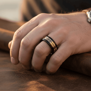 ERDIL — Lifestyle photo on hand — men's tungsten wedding ring.